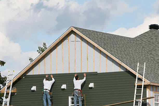 Professional Siding technician working in Westville, IL